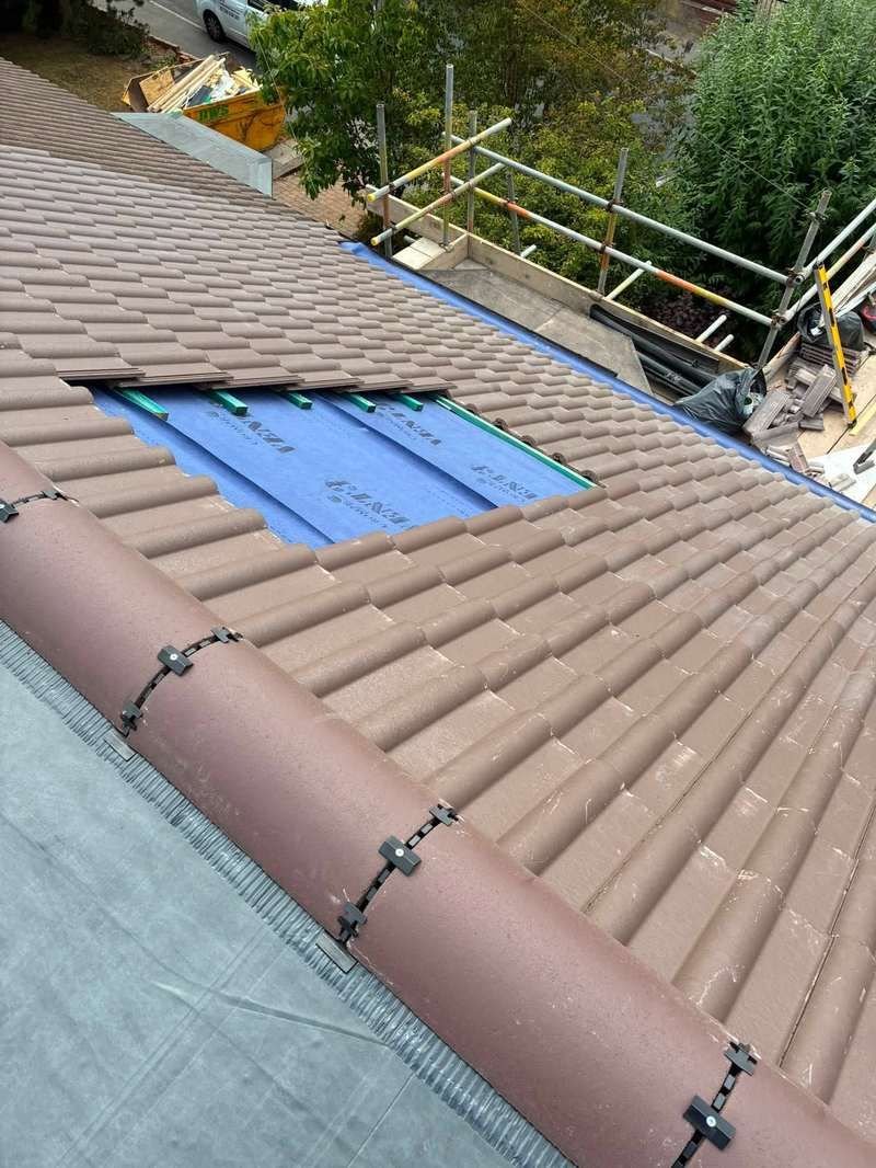 Re-roofing with new tiles by MT Joinery